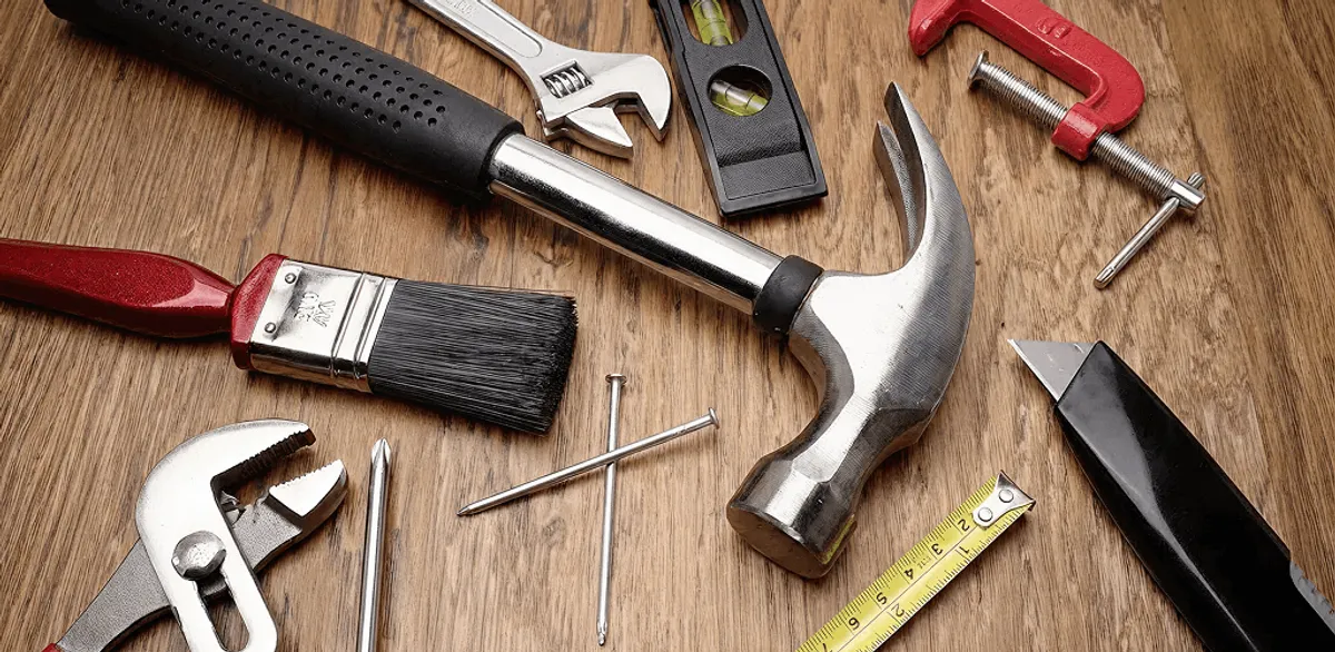 Handyman tools laid out for home repair and maintenance work in Jersey City, NJ